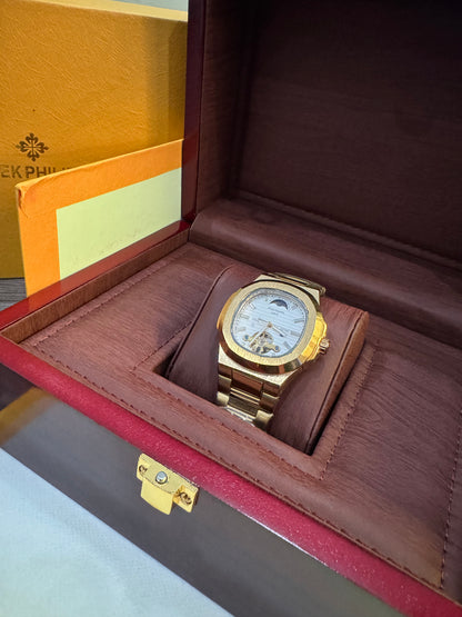 Rectangular Golden Patek Philippe automatic