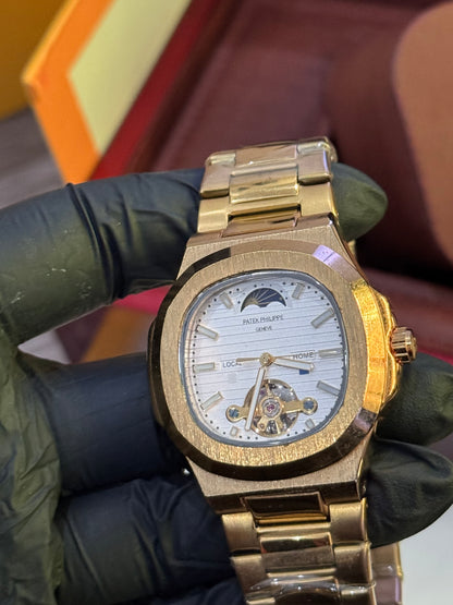 Rectangular Golden Patek Philippe automatic